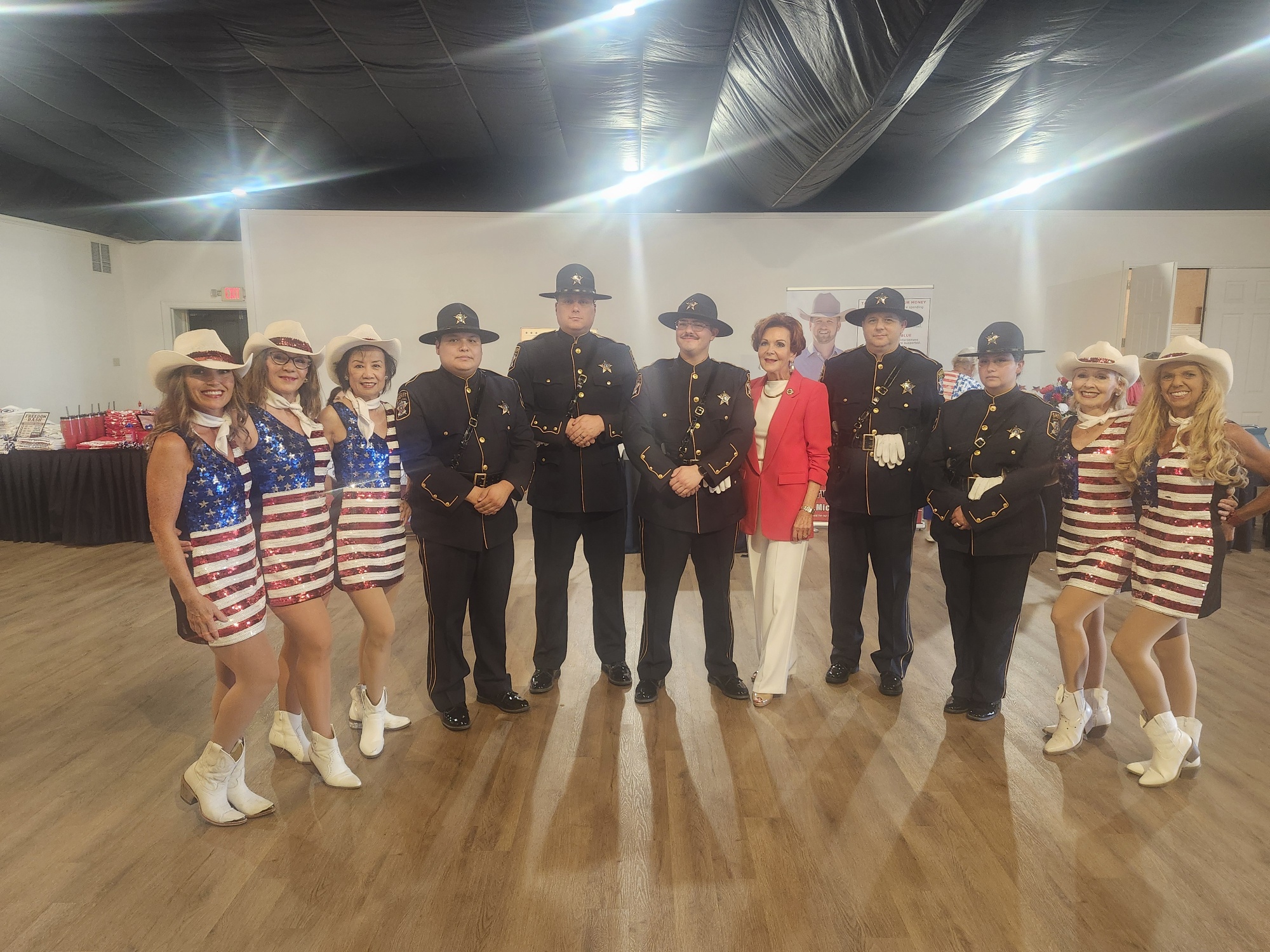 Sassafras Dance Group with sheriff's honor guard at a community event